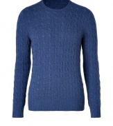 A luxury essential in a chic shade of heather blue, Ralph Laurens super soft cable knit cashmere pullover counts as a multi-season must - Round neckline, long sleeves, ribbed trim - Contemporary slim fit - Wear over shirts or tees with jeans, cords or chinos
