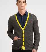 An electrifying pop of color trims and defines a layering classic, neatly woven in a luxurious blend of acrylic, wool and linen.Button-frontRibbed knit cuffs and hemWaist patch pockets40% acrylic/29% wool/18% linen/13% alpacaMachine washImported