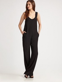 Trend-forward jumpsuit fashioned with a plunging scoopneck, slash pockets and an unexpected scoopback. Plunging scoopneckWide strapsSlash pocketsLow scoopbackInseam, about 35ViscoseDry cleanImported of Italian fabricModel shown is 5'11 (180cm) wearing US size Small.