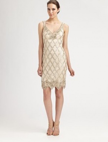 This romantic beaded design has a decidedly vintage sensibility.V necklineSleevelessScalloped hemlineLow V backConcealed side zipFully linedAbout 22 from natural waistNylonSpot cleanImportedModel shown is 5'10 (177cm) wearing US size 4. This romantic beaded design has a decidedly vintage sensibility.V necklineSleevelessScalloped hemlineLow V backConcealed side zipFully linedAbout 22 from natural waistNylonSpot cleanImportedModel shown is 5'10 (177cm) wearing US size 4.