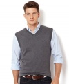 A simple layer like this sweater vest from Nautica adds some preppy polish to any look.