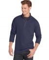Layer on the polish with the sleek, ribbed design of this zippered mock-neck sweater from Izod. (Clearance)