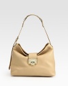 A classic silhouette crafted in rich pebbled calf leather with a metal logo plaque. Adjustable shoulder strap, 8½-9¼ dropFlap clasp closureOne inside zip pocketSuede lining12½W X 8½H X 3½DMade in Italy