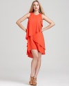 In a vibrant hue, BCBGMAXAZRIA's layered dress shows off in a sleeveless silhouette.