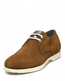 We love the gently sloping lines of this clever chukka/sneaker hybrid, crafted in fine Italian leather by Salvatore Ferragamo. We love the gently sloping lines of this clever chukka/sneaker hybrid, crafted in fine Italian leather by Salvatore Ferragamo.