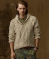 A wool-blend cardigan makes a cool, casual statement with a hint of slouch and a chunky cable-knit pattern.