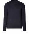 Elegant pullover in a fine dark blue wool and cashmere blend - Classic crew neck style - The cut is slim and straight with long sleeves - A casual classy basic for everyday wear - Very light, soft material - Small ribbed cuffs on the sleeves and hem - A classic favorite piece that works with all types of pants for leisure and business