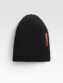 Wool channel ribbed beanie hat with signature leather logo detail.WoolDry cleanMade in Italy