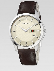 From the G-Timeless Collection. A beautiful blend of sleek stainless steel and supple leather to create a truly classic timepiece. Swiss quartz movementWater resistant to 5 ATMRound stainless steel case, 40mm (1.5)Smooth bezelDiamond patterned ivory dial with logo accentLuminous handsBar and numeric hour markersDate display at 4 o'clockDark brown leather strapMade in Switzerland From the G-Timeless Collection. A beautiful blend of sleek stainless steel and supple leather to create a truly classic timepiece. Swiss quartz movementWater resistant to 5 ATMRound stainless steel case, 40mm (1.5)Smooth bezelDiamond patterned ivory dial with logo accentLuminous handsBar and numeric hour markersDate display at 4 o'clockDark brown leather strapMade in Switzerland