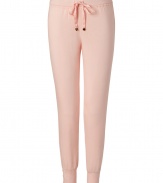 Sweet and feminine, these lace-trimmed pants are a must-have for downtime - Features drawstring waist and wide, tapered legs with cuffs - Pair with thin tanks, worn-in tees and boyfriend cardigan for a comfy leisure time look