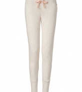 More chic than your average thermal, these neutral lounge pants from Juicy Couture will stylishly enliven your casual at-home style - Elasticized waist with bow drawstring, slim fit, large cuffs at hem - Wear with a matching camisole, fuzzy slippers, and a cozy robe