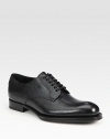 Leather lace-up style with exaggerated sole.Leather upperLeather liningWood/rubber soleMade in Italy