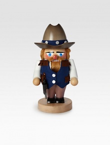 From his ten-gallon hat to this fringed vest to his six-shooter, this delightful wooden nutcracker is entirely hand-crafted in Germany.6 X 6 X 10½HCarved woodMade in Germany