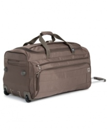 Fly lighter. Crafted from an innovative lightweight Dura-Tec material, this rolling duffel has a fully integrated fiberglass frame that rolls effortlessly along for the ride. A fully-lined interior is the perfect size for simply picking up & going and still packing in all of the necessary essentials. Fly lighter. Crafted from an innovative lightweight Dura-Tec material, this rolling duffel has a fully integrated fiberglass frame that rolls effortlessly along for the ride. A fully-lined interior is the perfect size for simply picking up & going and still packing in all of the necessary essentials.