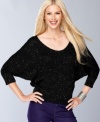 INC knows how to add dazzle to a basic pullover. Sequins woven right in make this sweater sparkle like the night sky. (Clearance)