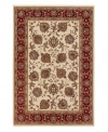 Reminiscent of classic Persian art and culture, this spellbinding rug features a wispy, curvilinear floral pattern in a neutral, burgundy and blue color spectrum. Surrounded by a thin beige border that completes the rug with understated elegance. Easy-care polypropylene ensures durability.