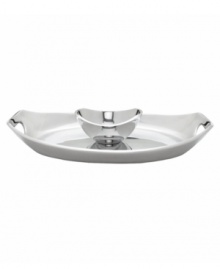 At once graceful and modern, this aluminum chip and dip reflects great taste at every meal. A radiant oval tray with sloping sides and handle cutouts holds an equally chic bowl for serving guacamole, salsa, or spinach dip. From Dansk's collection of serveware and serving dishes. At once graceful and modern, this aluminum chip and dip reflects great taste at every meal. A radiant oval tray with sloping sides and handle cutouts holds an equally chic bowl for serving guacamole, salsa, or spinach dip. From Dansk's collection of serveware and serving dishes.