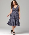 An ultra-flattering A-line shape elegantly outlines Style&co.'s sleeveless plus size dress, featuring a tiered skirt-- wear it from day to date night!