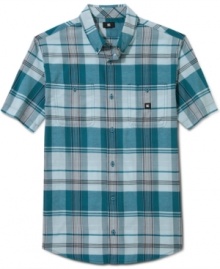 Pop some plaid into your wardrobe with this short-sleeved shirt from DC Shoes for some timelessly cool summer style. Pop some plaid into your wardrobe with this short-sleeved shirt from DC Shoes for some timelessly cool summer style.