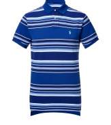 Detailed in ultra soft cotton pique, this striped polo is the epitome of the timeless classic Ralph Lauren look - Small royal collar, button placket, short sleeves, royal trim, embroidered polo player at chest, slit sides, high-low hemline - Classic cut - Wear with everything from jeans and sneakers to colored cords and loafers