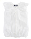 The pretty top is crafted from soft, comfortable cotton jersey detailed with charming ruffles and pintucking.