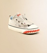 A fierce shark adds a splash of danger to this not-so-traditional pair of Chuck Taylors.Slip-onCanvas upperCanvas liningRubber soleTraditional Chuck insoleImported