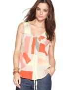 Get graphic in this easy petite tank top from DKNY Jeans, featuring a striking paint-inspired print and a relaxed silhouette. Pair it with cropped pants for laid-back style!