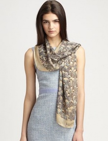 A pretty feather print design with a solid border in luxurious silk. SilkAbout 27½ X 71Dry cleanItaly A pretty feather print design with a solid border in luxurious silk. SilkAbout 27½ X 71Dry cleanItaly