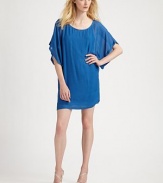 Filmy mesh chiffon drapes in an effortless scoopneck sheath.BoatneckDropped shouldersShort sleevesSleeveless polyester liningAbout 24 from natural waist63% silk/37% viscoseDry cleanImportedModel shown is 5'10½ (179cm) wearing US size Small.