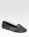 Slip on the simple ease of this lush calf hair design, revitalized with an irresistible giraffe print. Giraffe-print calf hair upperLeather liningRubber solePadded insoleImported