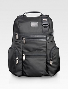 An endlessly versatile, always casual backpack design for business, school, commuting and travel in durable ballistic nylon. Zip closure Top handles Shoulder straps Exterior zip pockets Interior zip pockets, divider wall Nylon with leather accents 12W X 17H X 6D Imported An endlessly versatile, always casual backpack design for business, school, commuting and travel in durable ballistic nylon. Zip closure Top handles Shoulder straps Exterior zip pockets Interior zip pockets, divider wall Nylon with leather accents 12W X 17H X 6D Imported
