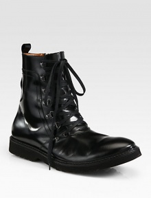 Lace-up ankle boot flawlessly crafted in smooth, sleek Italian leather, completed with a comfortable rubber sole.Leather upperLeather liningPadded insoleRubber soleMade in Italy Lace-up ankle boot flawlessly crafted in smooth, sleek Italian leather, completed with a comfortable rubber sole.Leather upperLeather liningPadded insoleRubber soleMade in Italy