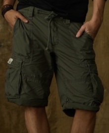 As comfy as sweats but just as rugged as the classics that came before it, this dense poplin cargo short is updated with a jersey-knit lining for supreme softness. As comfy as sweats but just as rugged as the classics that came before it, this dense poplin cargo short is updated with a jersey-knit lining for supreme softness.
