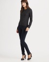 A casual crewneck crafted from nubby melange knit with raised seams for shapring.CrewneckLong sleevesRibbed trimCenter back zipperAbout 22 from shoulder to hem36% wool/28% rayon/27% nylon/5% metallic fibers/4% cashmereDry cleanImported