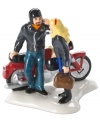 Ride on. This vibrant young couple travels in style, taking a bold red Harley to Snow Village's biggest holiday bash. A must-have figurine for bikers, from Department 56.