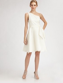 EXCLUSIVELY AT SAKS. The little white dress in an elegant one-shoulder design with flared skirt.Asymmetrical neckline Side zip closure About 26 from natural waist Polyester; dry clean Made in USA