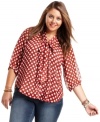 Get spotted in Eyeshadow's three-quarter-sleeve plus size blouse, featuring a polka-dot print-- it's uber-cute!