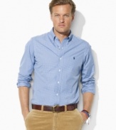 Cut for a classic, relaxed fit, a handsome sport shirt rendered in crisp woven cotton exudes timeless style.