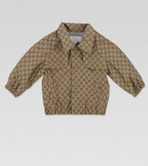 Waterproof nylon jacquard is adorned with hidden snaps, signature web detailing and iconic G's for a stylish topper.Point collarLong sleevesHidden snap front with signature web detailingElastic cuffs and waistbandFront slash pocketsFully lined60% polyamide/40% polyesterDry cleanMade in Italy