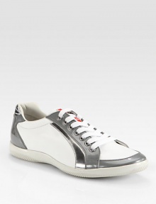 A sharply-defined look in metallic nylon with suede detail and a debossed logo on the side. Leather lining Padded insole Rubber sole Imported A sharply-defined look in metallic nylon with suede detail and a debossed logo on the side. Leather lining Padded insole Rubber sole Imported