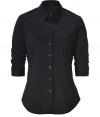 Both classic and cool with a flattering modern tailored fit, Steffen Schrauts black smoke sleeve shirt is a chic choice packed with wearing possibilities - Classic collar, ruched 3/4 sleeves with stitched cuffs, button-down front, shirttail hemline - Tailored fit - Wear with bright flats, slim-fit separates and a carryall tote to work