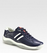 Clean, sporty design with contrast leather detail.Leather upperPadded insoleRubber soleImported