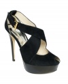 The sexy texture of MICHAEL Michael Kors' Eboni platform sandals makes this style a glamourous one. A buckled strap criss crosses the open vamp for an interesting look.