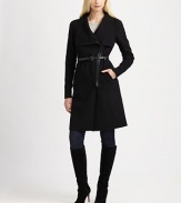 Featuring buttery leather details, slash pockets and a skinny belt, this chic design has all the makings of the most perfect coat ever. Wide collarLeather detail along zipper closureBelted silhouetteSlash pocketsPrincess seamsAbout 39 from shoulder to hem80% wool/20% viscoseDry clean by leather specialistImported Model shown is 5'10 (177cm) wearing US size Small. 