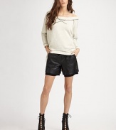 Soft French terry finished with contrast stitching in a slightly oversized pullover.Boatneck Raglan sleeves cropped above wristsAsymmetrical hemAbout 29 from shoulder to hemCottonDry cleanImported