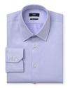 Slightly trimmer than the classic fit, button front long sleeved shirt. Voluminous spread collar. Squarely beveled cuffs with two buttons one above the other. Flat back yoke with no pleats. Clean front, no pocket. Rounded hem. Diamond pattern, textured.