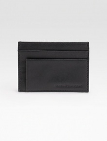 EXCLUSIVELY OURS. A standard-bearer of classic style, crafted in our own pebbled calfskin leather. A slim-line design in our own pebbled calfskin leather that slips easily into any pocket. Two card slots 4 X 3 Imported 