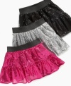 Shine on! Your little starlet will sparkle at anything she does in this sequin skirt from Beautees.