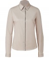 Elevate your workwear wardrobe with stylish staples like Jil Sander Navys luxe, almond-hued, cotton stretch blouse - Slim, feminine cut tapers gently through waist - Contrast piping at collar and button placket - Long, cuffed sleeves and rounded hem - Polished and versatile, ideal for pairing with a blazer and suit trousers or with a cardigan and pencil skirt