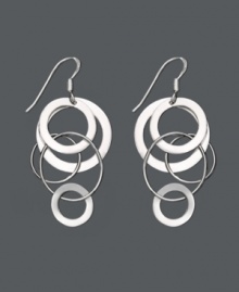 Let chic circles orbit your earlobes. These funky asymmetrical earrings feature interlocking circles set in sterling silver. Approximate drop: 2 inches. Let chic circles orbit your earlobes. These funky asymmetrical earrings feature interlocking circles set in sterling silver. Approximate drop: 2 inches.